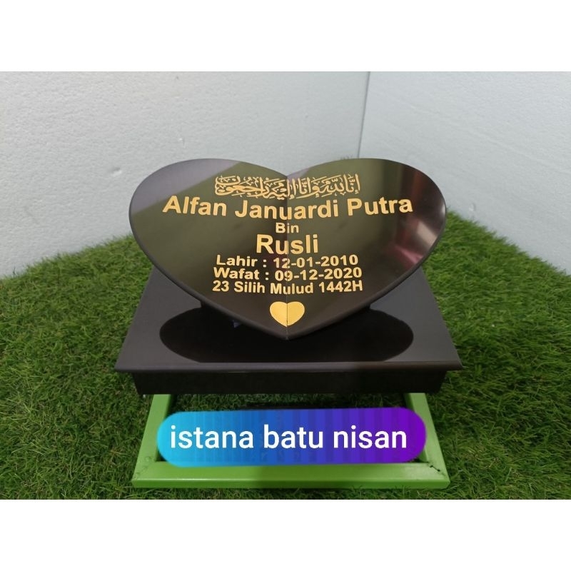 Dudukan batu nisan
