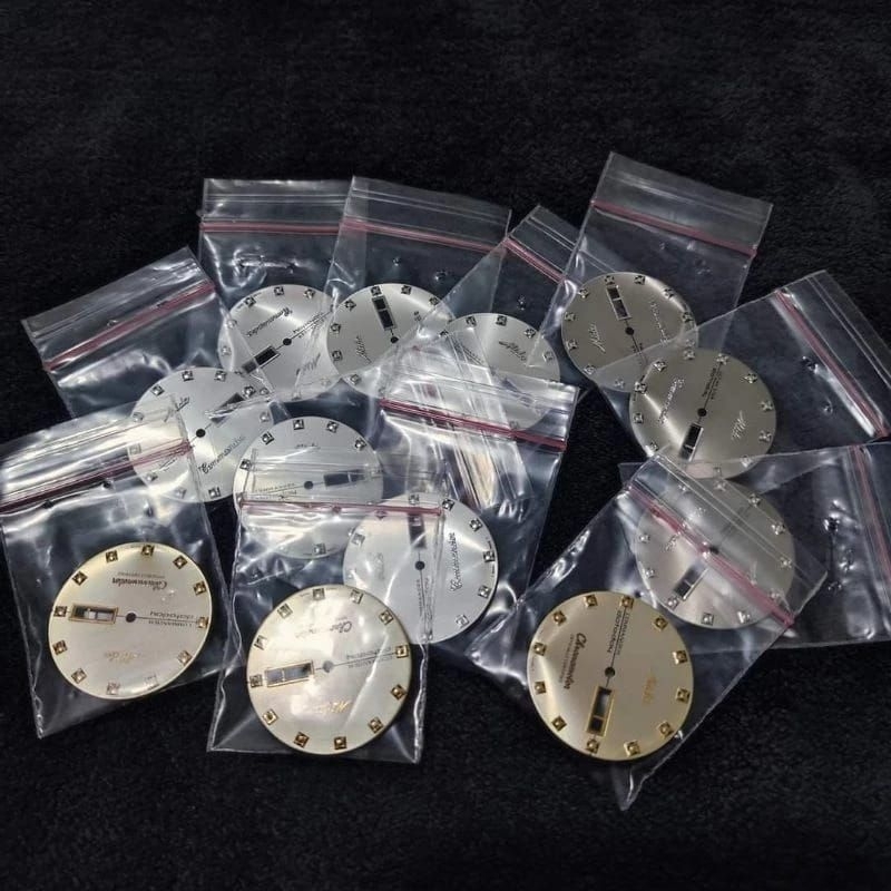 plat dial Mido commander tanggal hari
