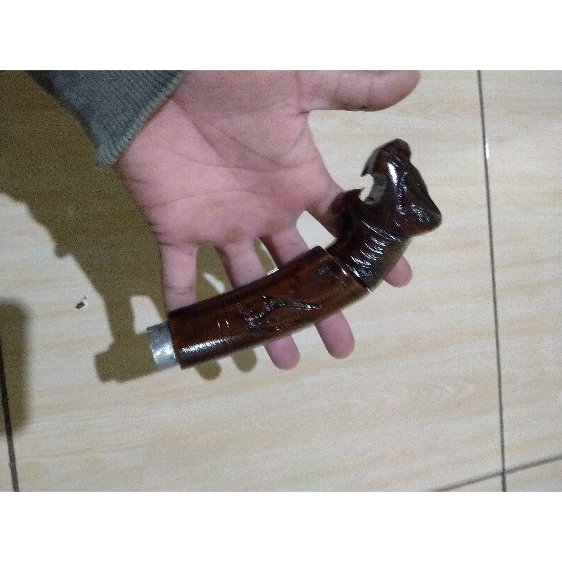 Gagang pisau ukir macan