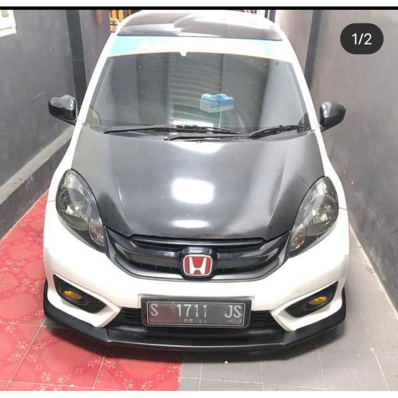 kap mesin Carbon Brio lama