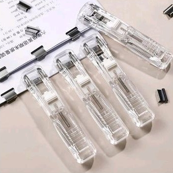 Penjilid kertas mesin klip plus isi