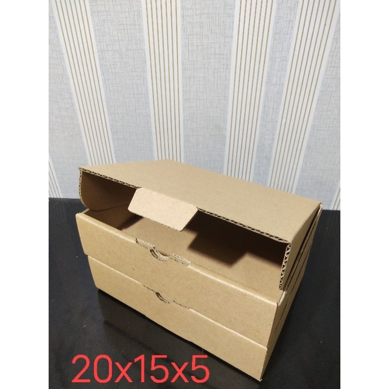 

PAKET 1KG ISI 20pcs . kardus 20 X 15 X 5 COKELAT die cut