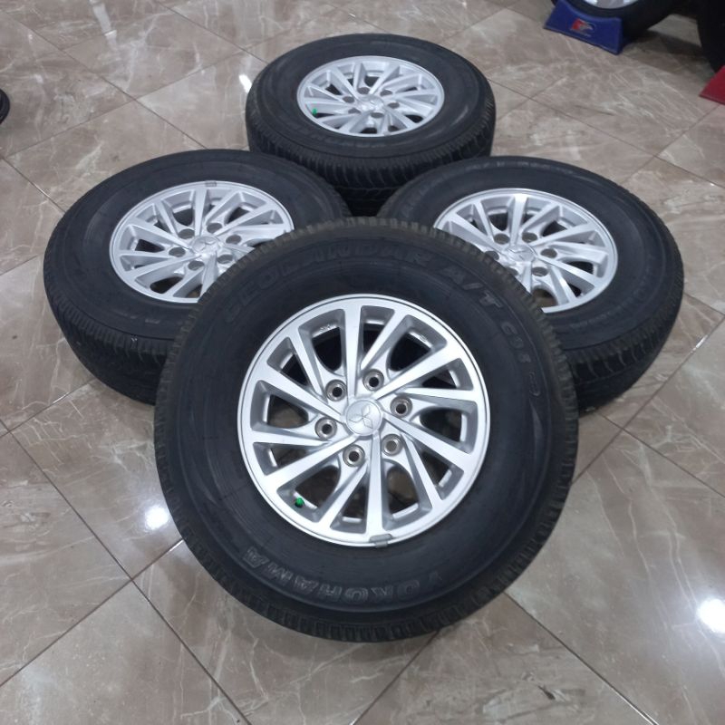 VELG OEM STANDAR PAJERO R16 PCD 6X139.7 ET 38 + BAN 265/70 R16 YOKOHAMA
