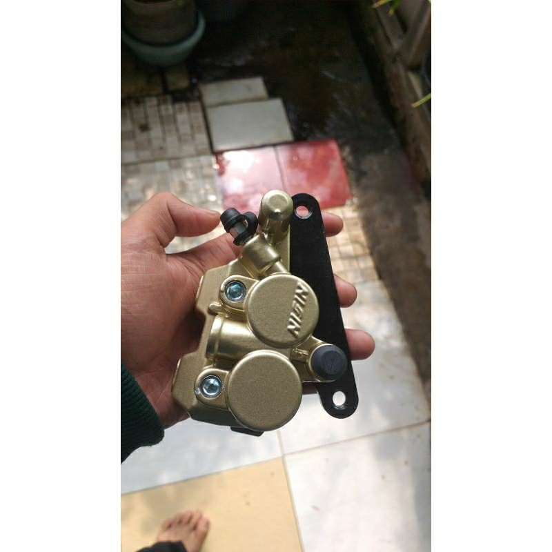 kaliper pala babi depan supra x 125, tiger