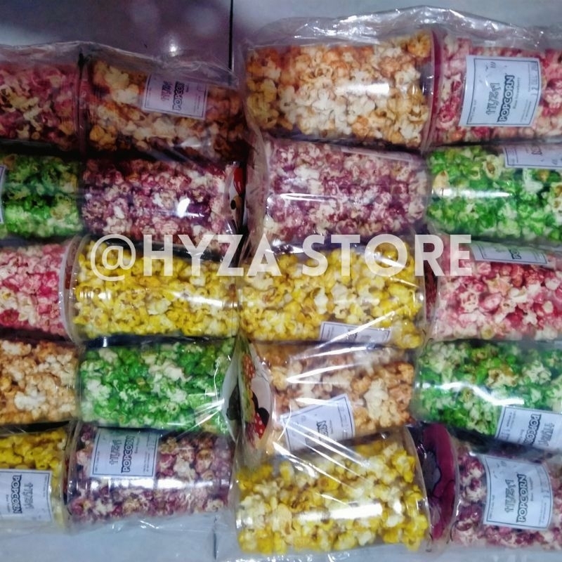

Hyza PopCorn Cemilan Murah Berkualitas Mix Rasa Strawberry,Nangka,Pandan,Coklat & Anggur Cup 16oz 1pack Isi 10biji