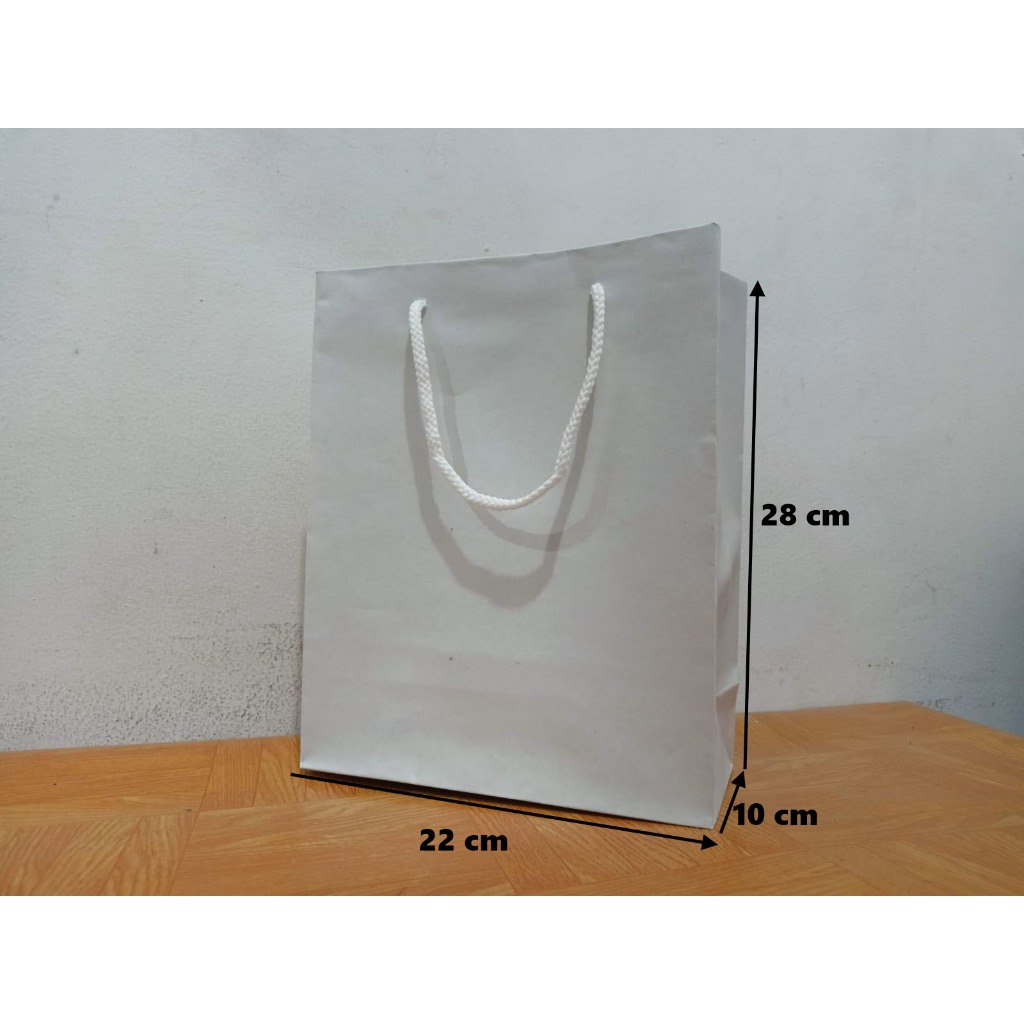 

PaperBag Polos - Kraft Putih - 22cm x 10cm x 28cm