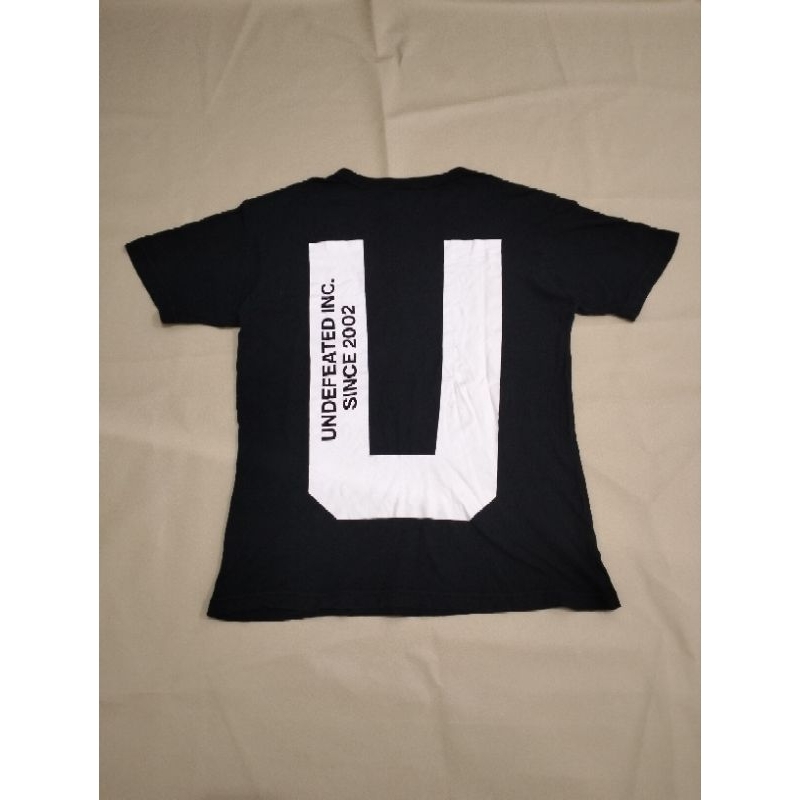 Kaos CHAMPION X UNDEFEATED Second
