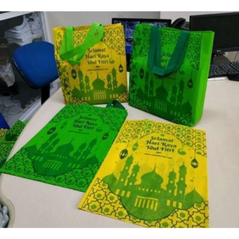 

1 Lusin (isi 12 pcs)Goodie bag LEBARAN 25x35x8 Sablon 1 sisi/ tas idul Fitri/ tas spunbond