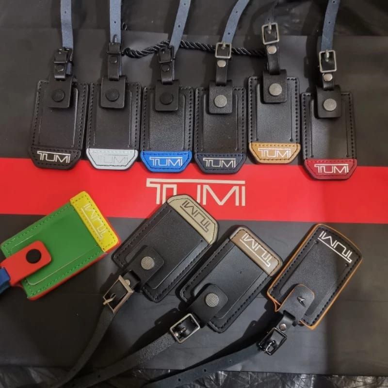 

Name Tag Tumi Gantungan aksesoris Tas Tumi kulit import