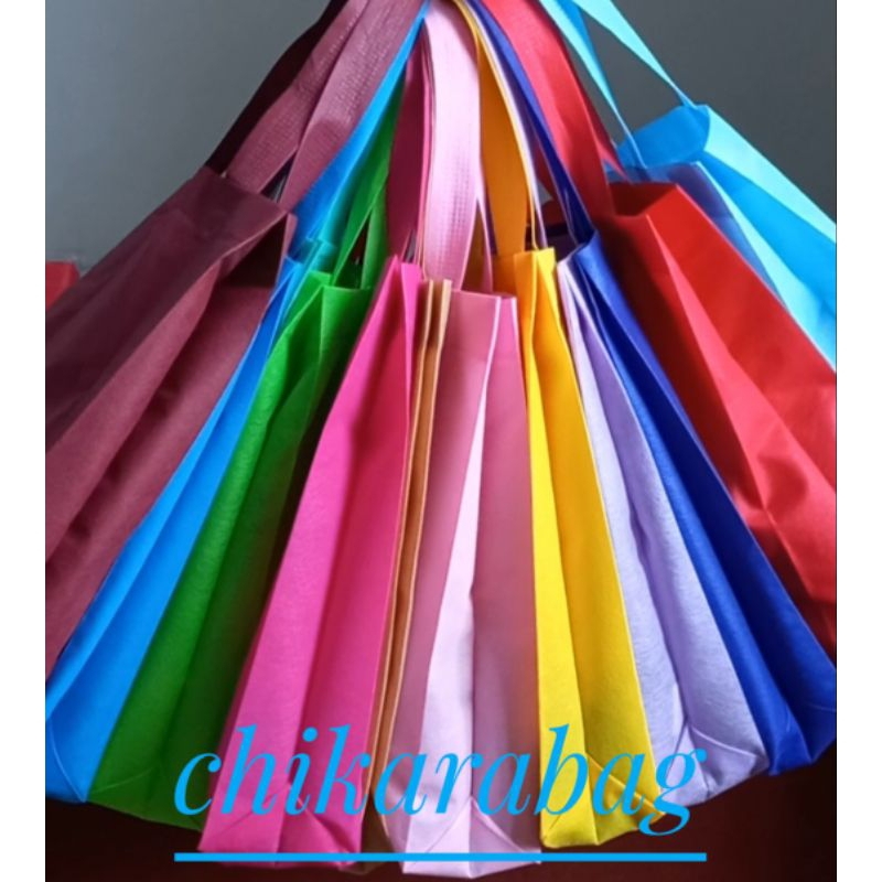 

(12PCS)TAS SPUNBOND SOUVENIR HANDLE BAG UKURAN 20X30X8 TEBAL 75 GSM