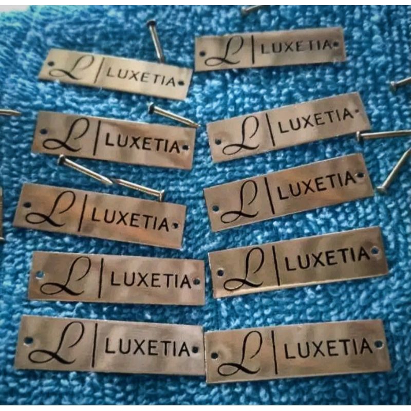 

label plat hijab plat baju | bahan stainless stell & plat kuningan | bisa custom