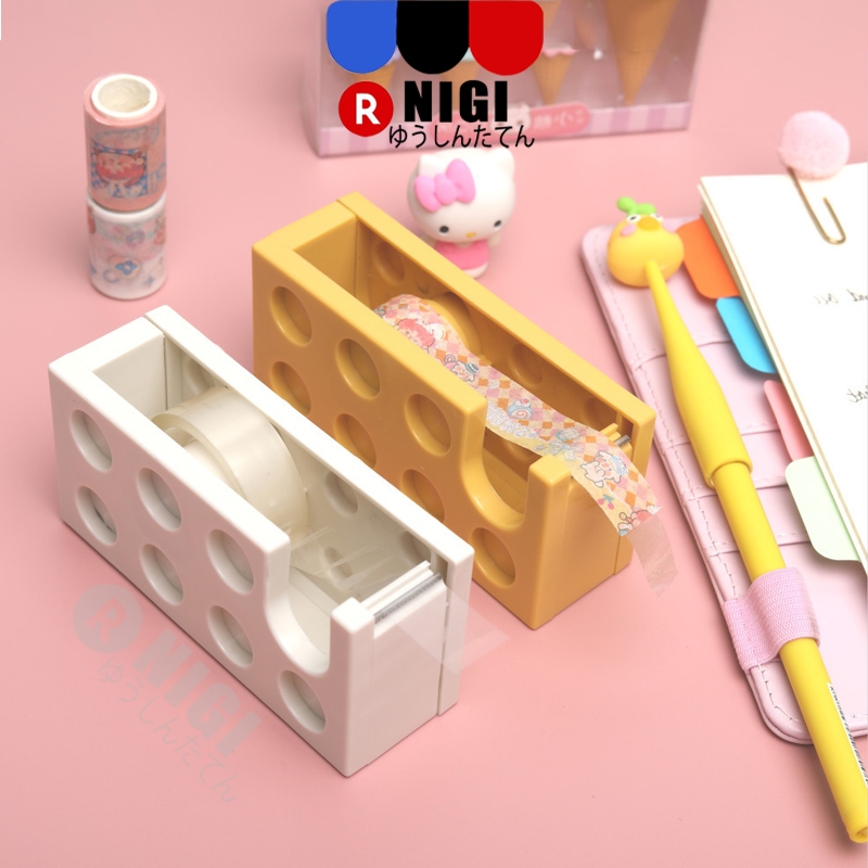 

NIGI Dispenser Isolasi / Tape Cutter/Tape Dispenser /Tempat Selotip