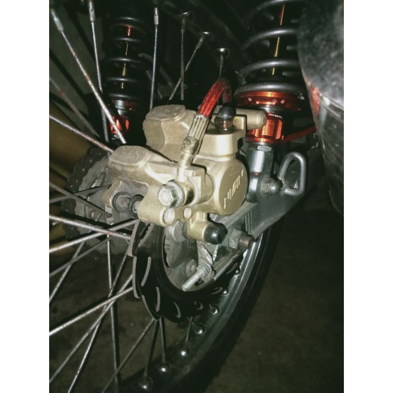 kaliper belakang ori supra x125