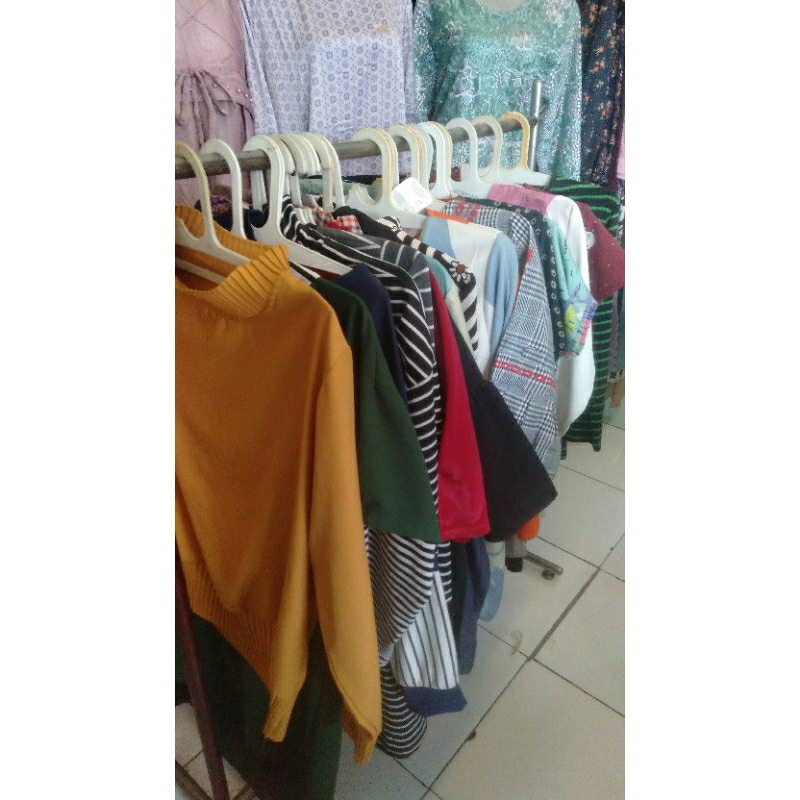 Cuci gudang baju atasan wanita