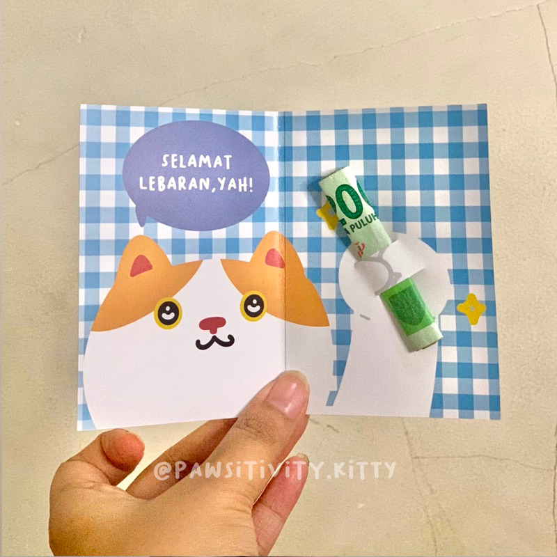 

Amplop Lebaran Unik Kucing Viral