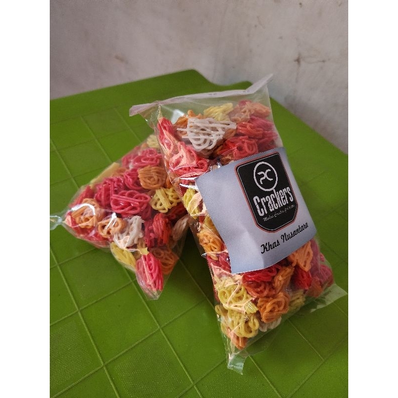 

Kerupuk Mentah Mawar Mini Warna (Amoi) kemasan 250 Gram