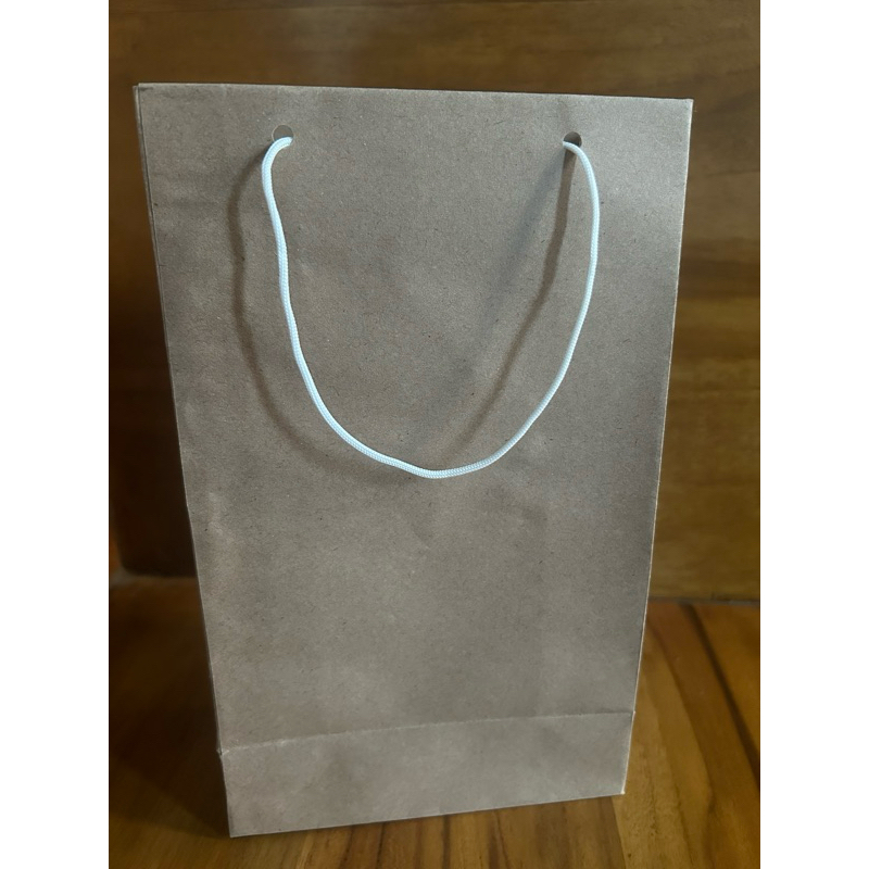 

Paper Bag Polos Isi 12 Pcs ( -+25x15x7 cm )
