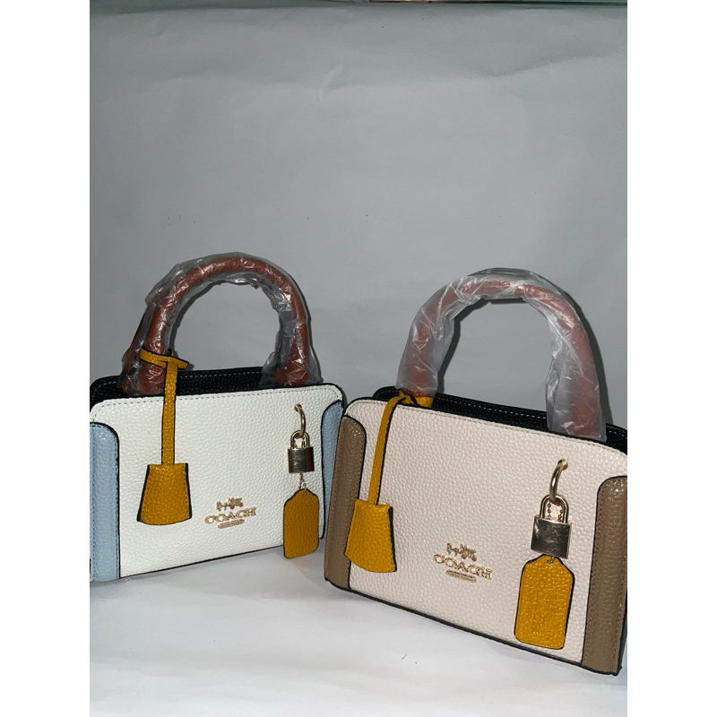 tas import wanita coach