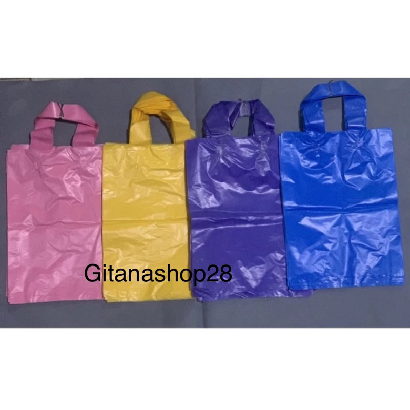

*20x28* Kantong Plastik Shoft Handle/ Kantong Souvenir polos UK. 20x28 tebal 0,4 mm @25 pcs