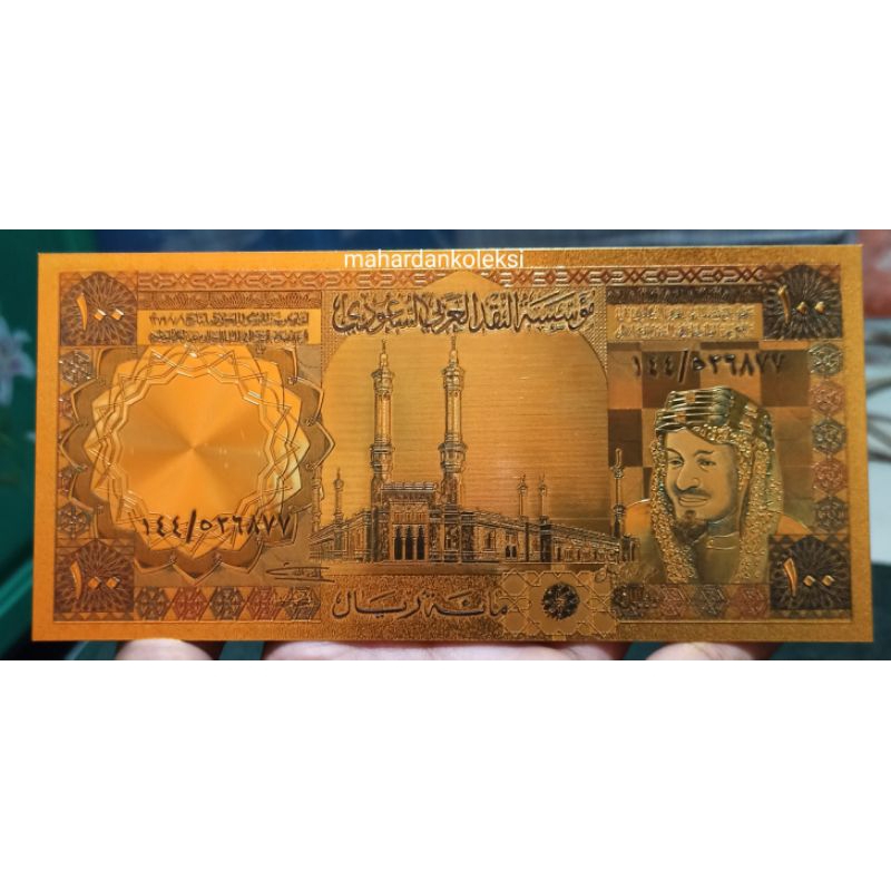 uang 100 riyals arab saudi souvenir gold foil / replika