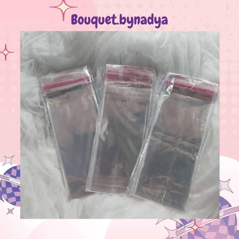 

Plastik uang, plastik buket uang, plastik lem OPP 7x15, plastik roti, plastik OPP lem bening