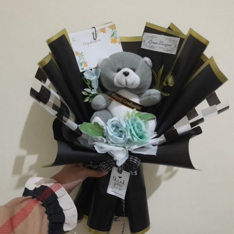 

Buket Wisuda Boneka