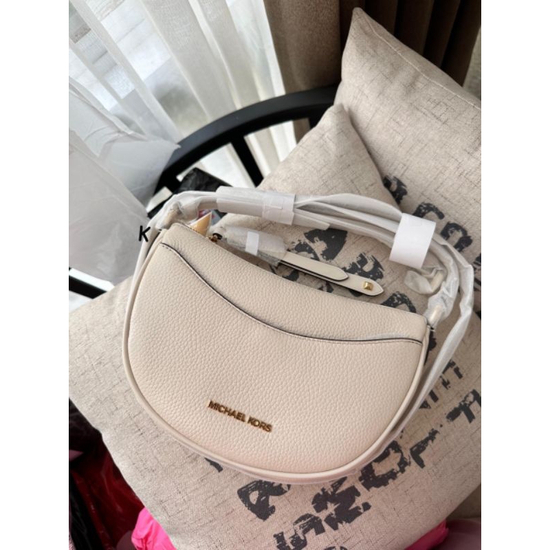 mk dover half moon crossbody light cream original