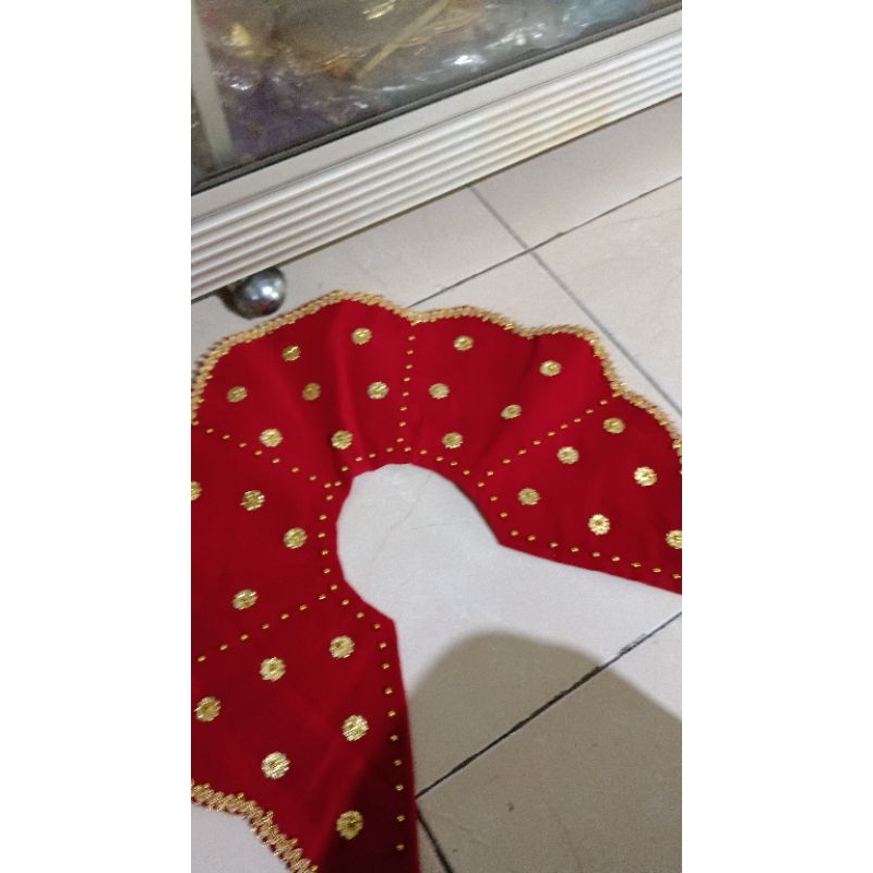 Tutup dada/teratai tari adat Palembang