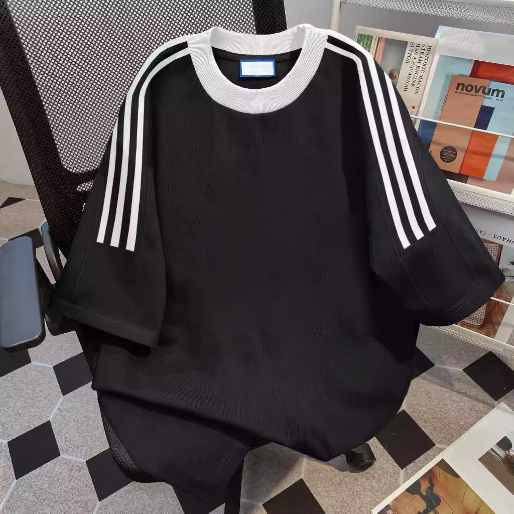 Kaos lengan pendek pria warna solid baru tiga garis hitam atasan serbaguna longgar baju pria kaos po