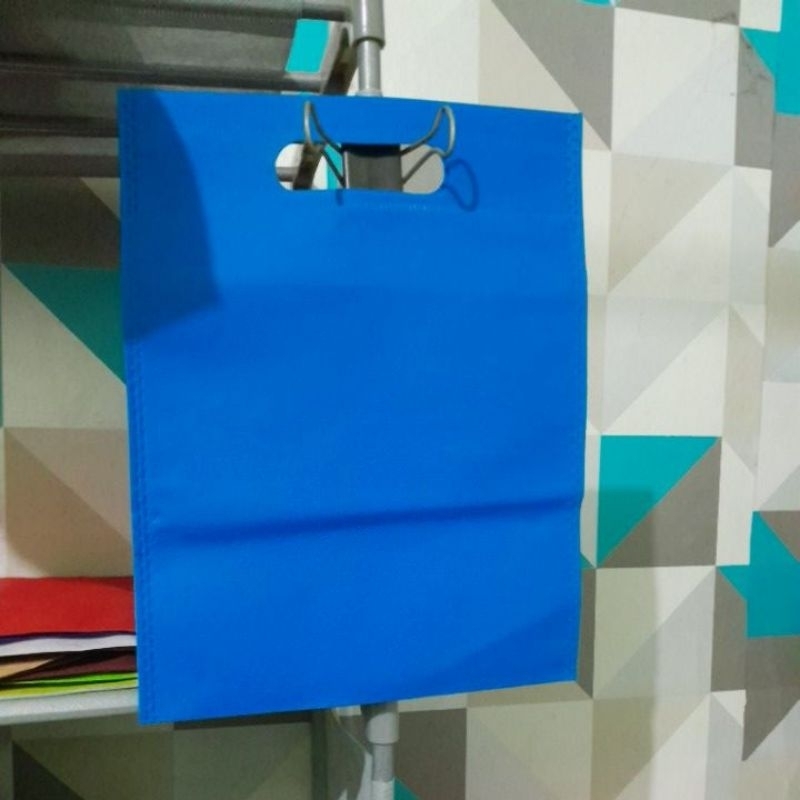 

tas polos biru tengah 20x26 cm