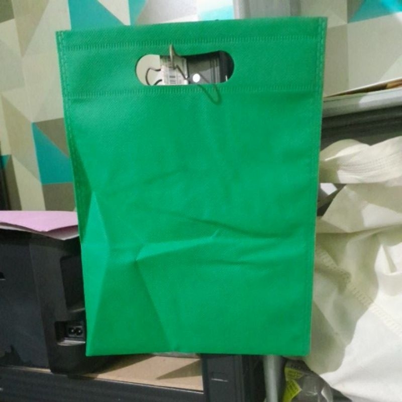 

tas polos oval hijau tua 25x35