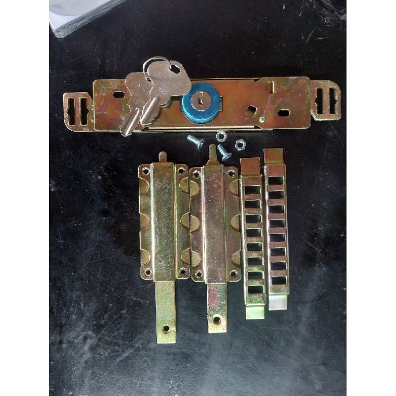 1 set Kunci + slot rolling door