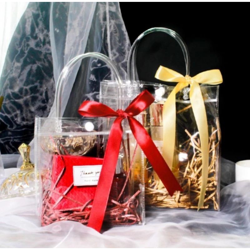 

Goodie Bag Transparan Kancing Goodie Bag PVC Transparan Hampers Bag