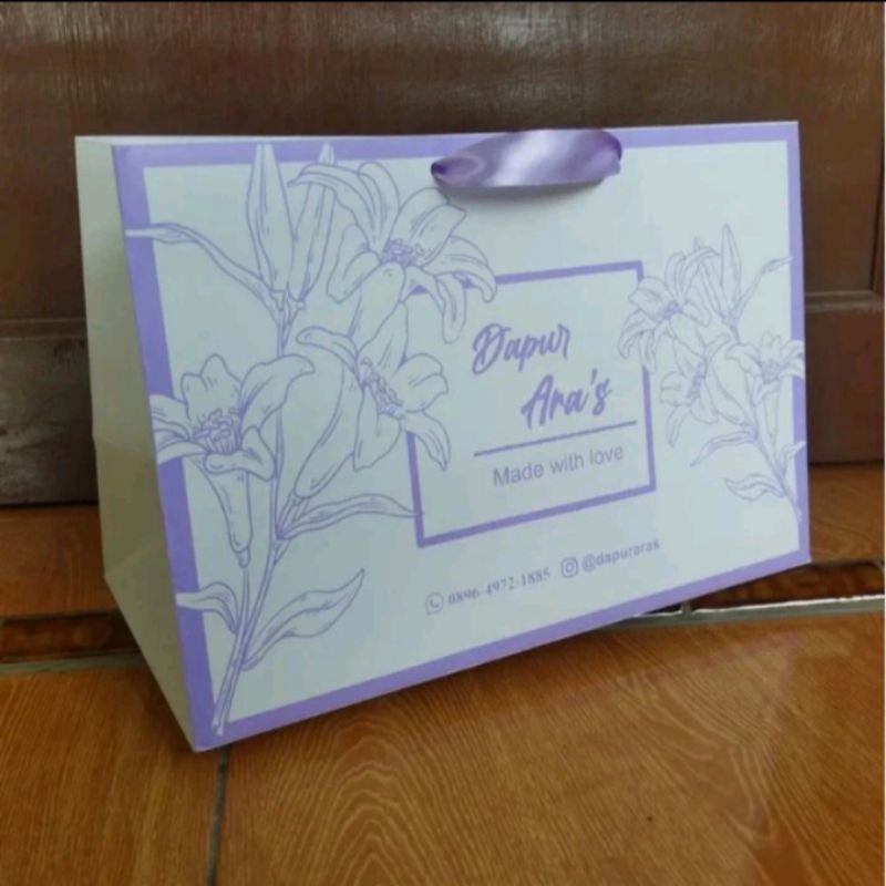 

PAPERBAG IVORY GLOSSY LANDSCAPE UKURAN 35*12*30, 35*15*25, 37*10*30, 30*20*20