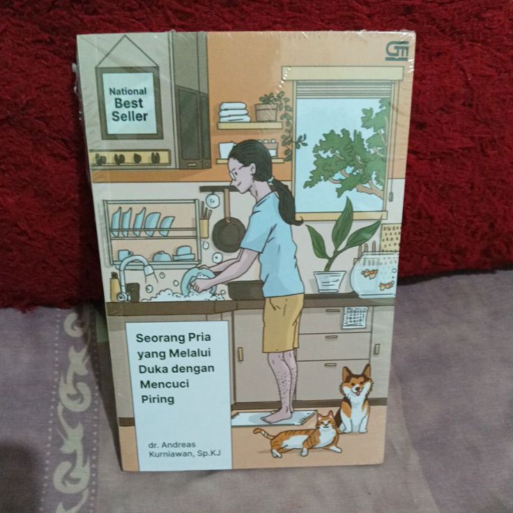 Seorang pria yang melalui duka dengan mencuci piring