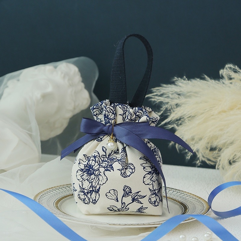 

Kantong pouch hampers serut natal bahan canvas Blue D**R