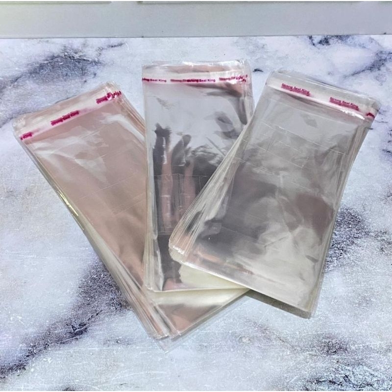 

PLASTIK OPP LEM UKURAN 7x1 5cm (LEM) 100pcs/ pack OPP KERTAS SOUVENIR PESTA