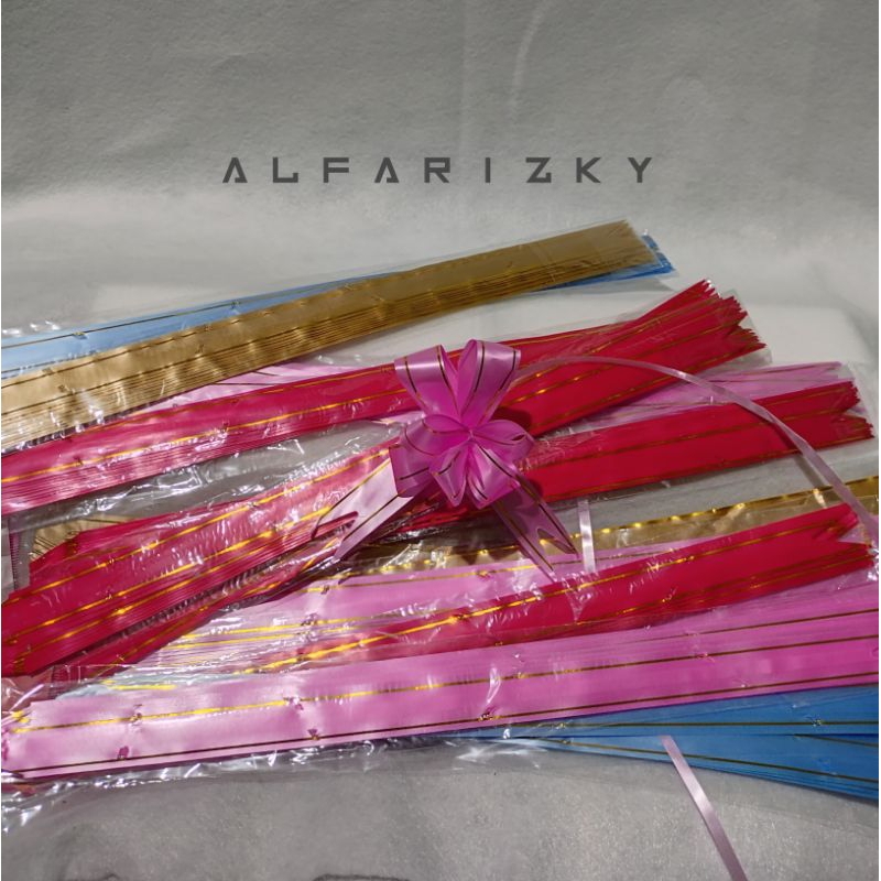 

pita serut tarik cocok buat pita kado/buqet dll 24mm panjang 40cm isi 10 pcs
