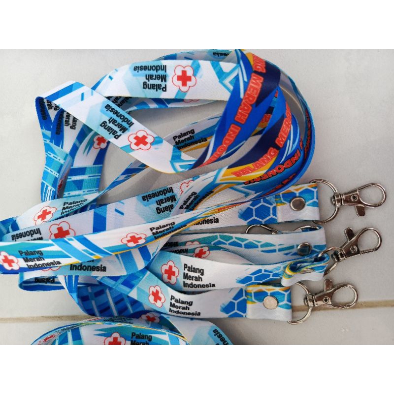 

TALI LANYARD ID CARD 2 CM 2 SISI PMI DESAIN 6 TANPA STOPLER