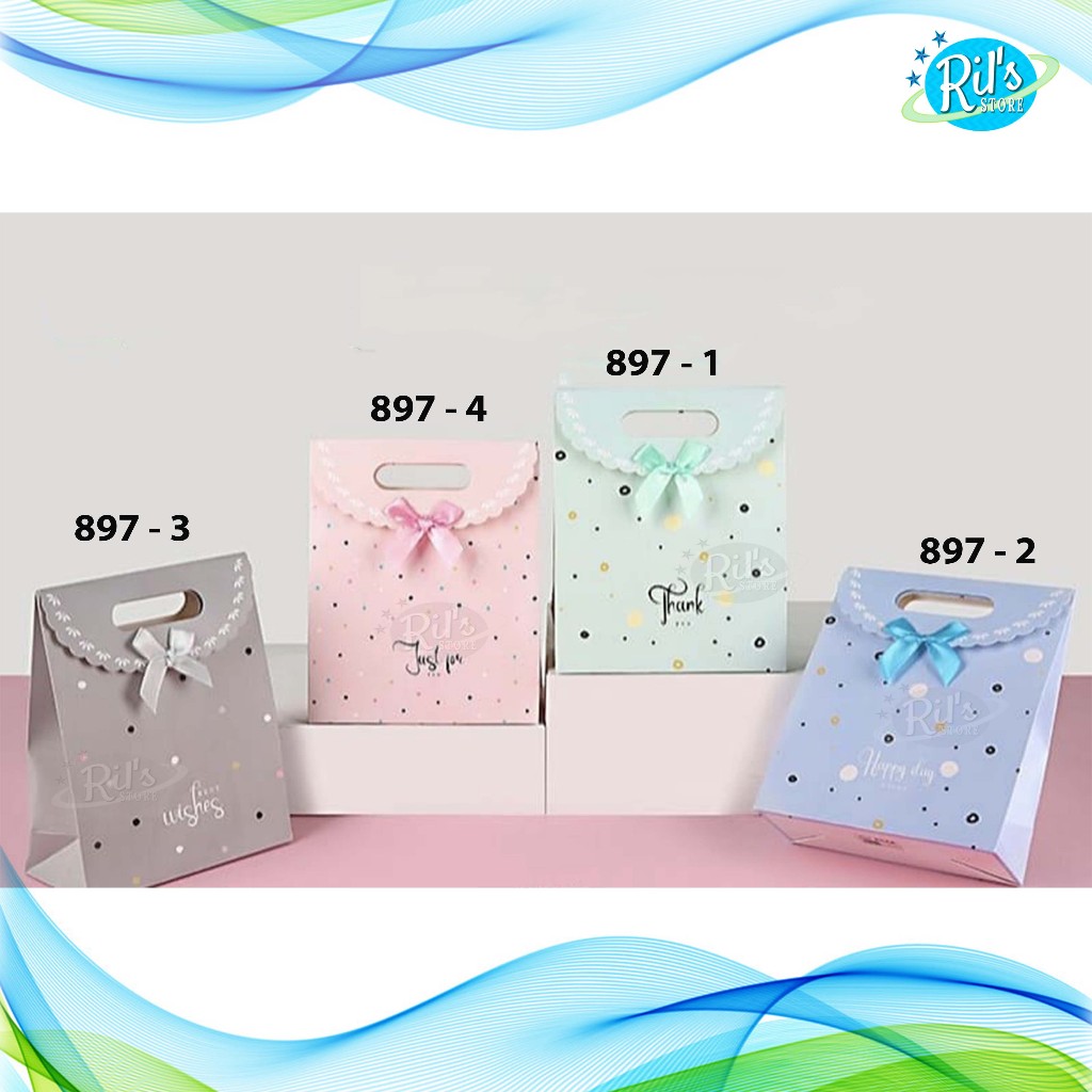 

PAPERBAG GLOSSY PREMIUM KECIL 19X9.5X27CM - PAPERBAG PARTY POND - KADO - KECIL - PITA POND