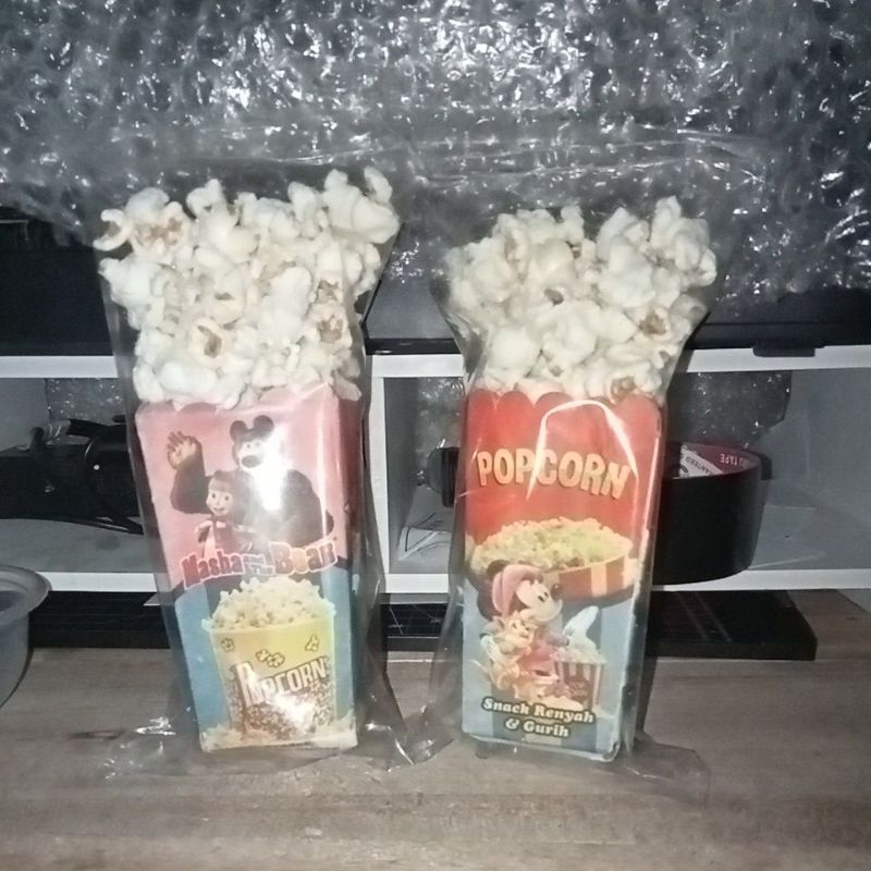 

Pop Corn kemasan Karakter Kartun