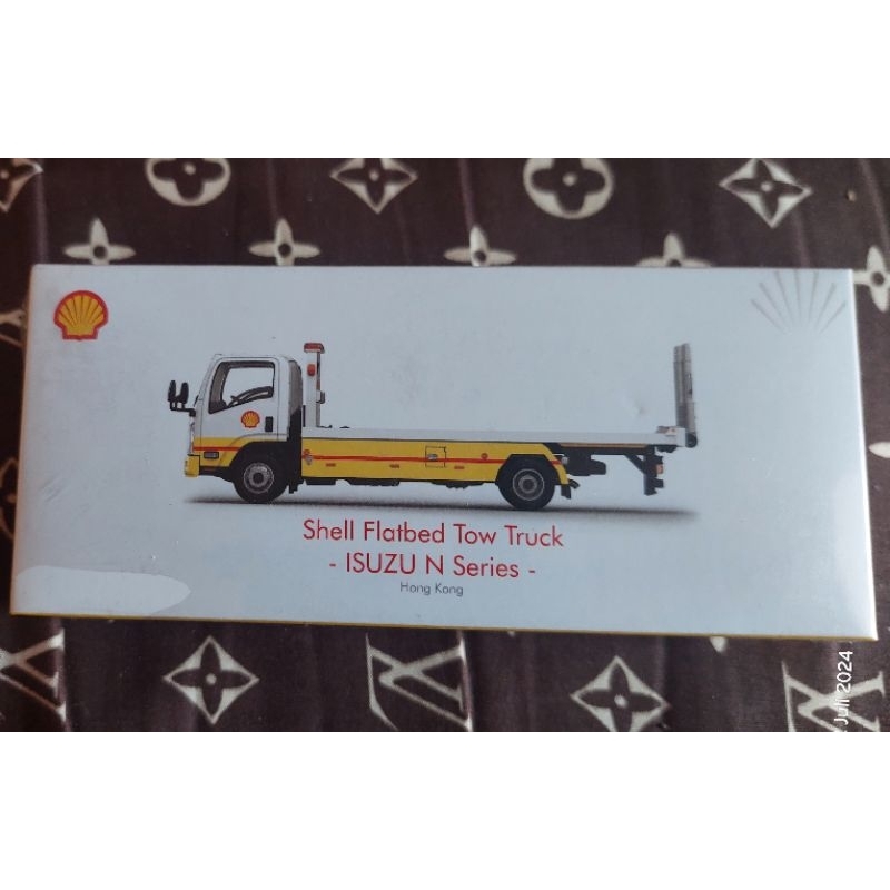 tiny isuzu N series shell flatbed tow truck segel