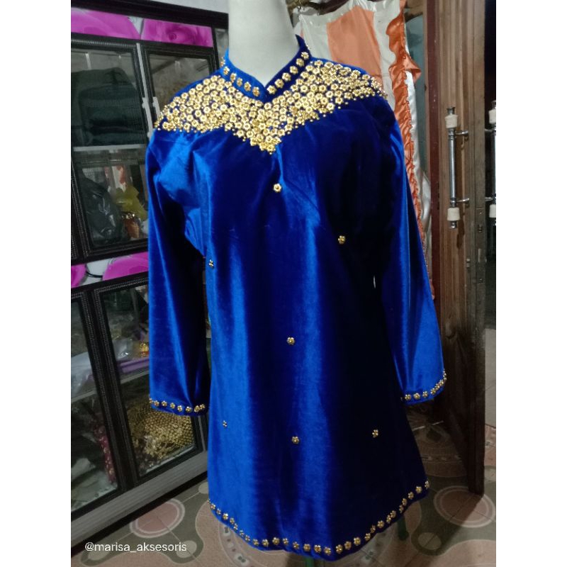 Baju tari tradisional Palembang