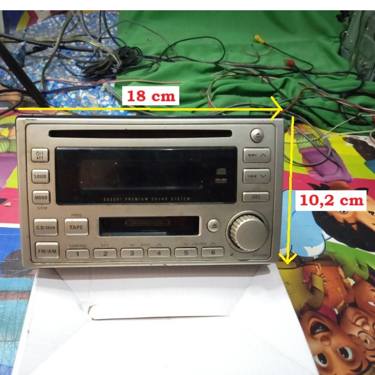 TAPE MOBIL BEKAS JADUL. RADIO KASET ORIGINAL SUZUKI APV. HEAD UNIT BEKAS SUZUKI APV. KONDISI BEKAS.