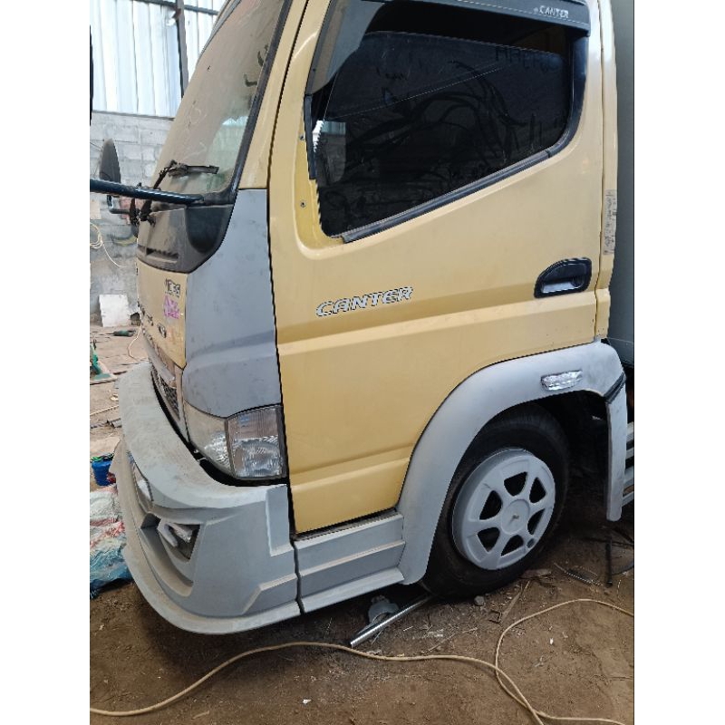 slebor depan Canter coak lampu