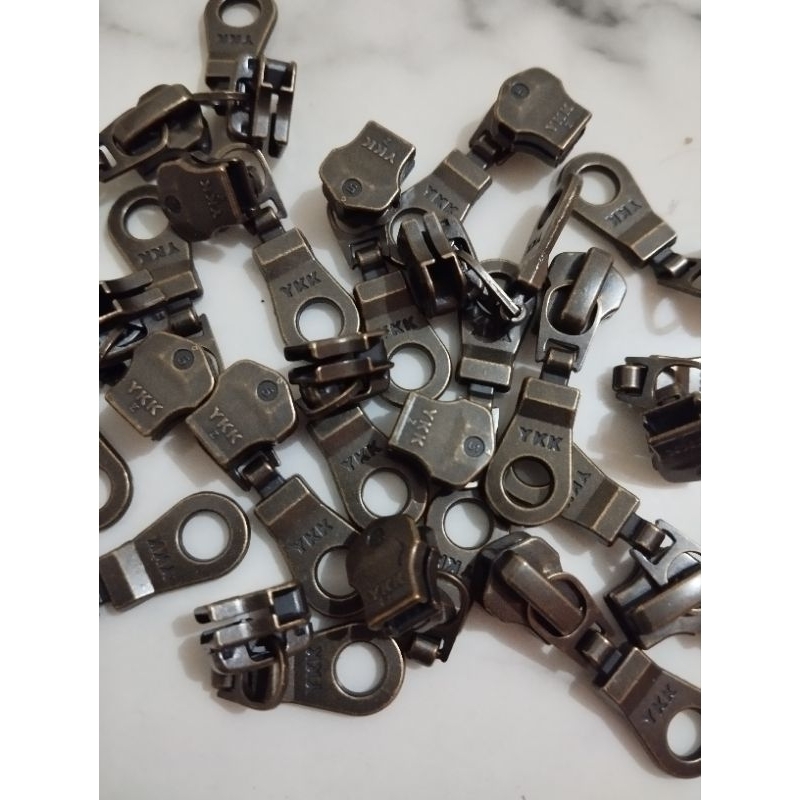 Kepala resleting zipper YKK No.5 atg bakar