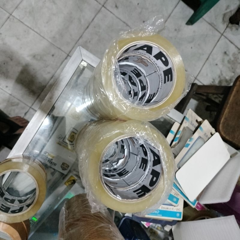 

lakban bening ukuran 45mmx90yard micron 50 jamin real ukuran isi 6pics