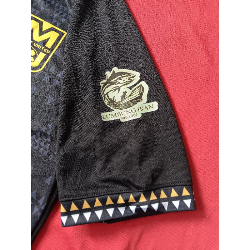 jersey malut united hitam 2024