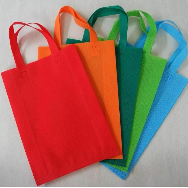 

Goodie bag spunbond tas kain kantong belanja tas souvenir ultah tote bag polos warna