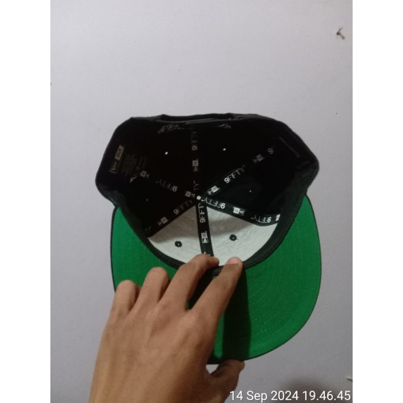 topi newera